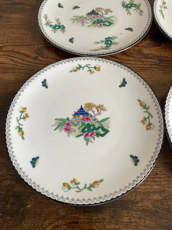 Rare early Royal Doulton pagoda plates x4