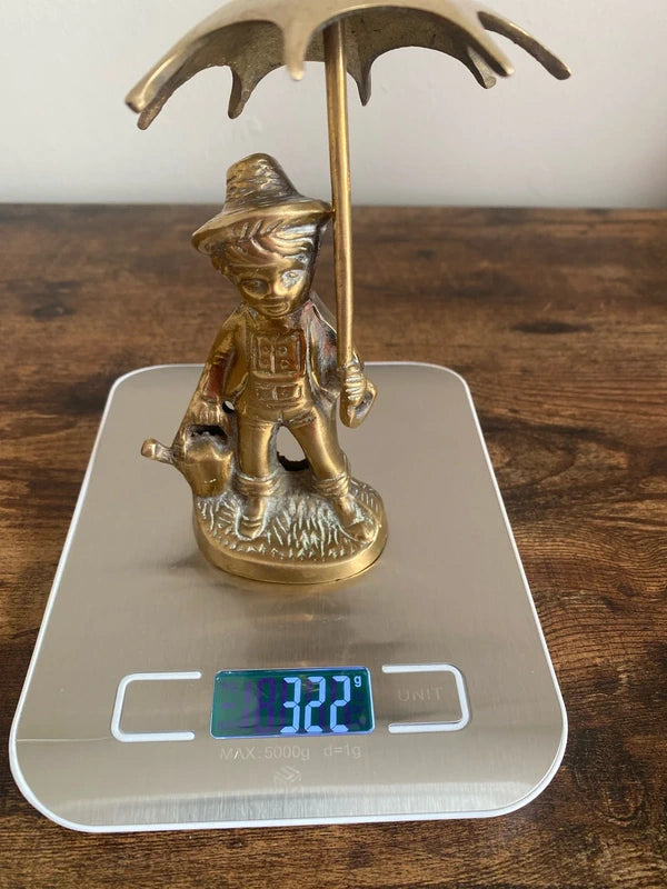 Vintage Brass Figurine Young Farm Boy Holding an Umbrella