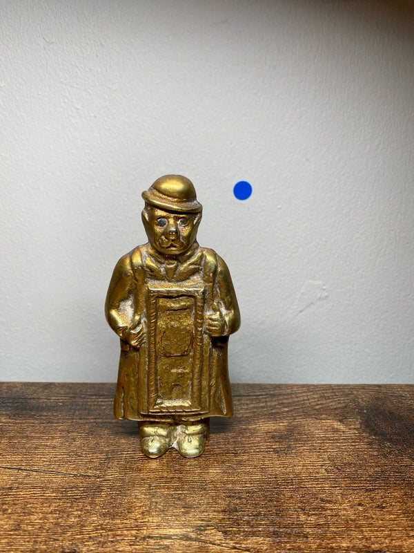 Vintage cast brass figurine 1950’s England blue gem eye