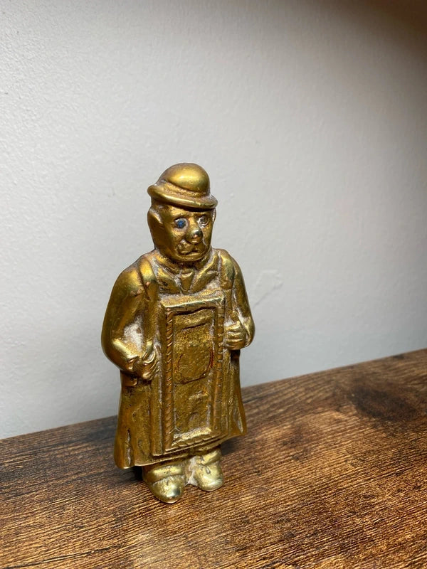 Vintage cast brass figurine 1950’s England blue gem eye