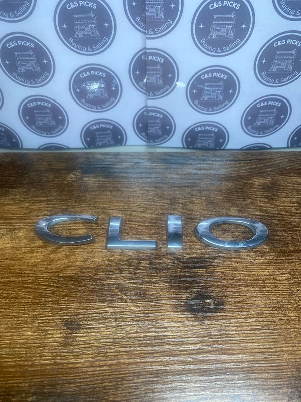 Renault Clio car badge emblem logo script lettering