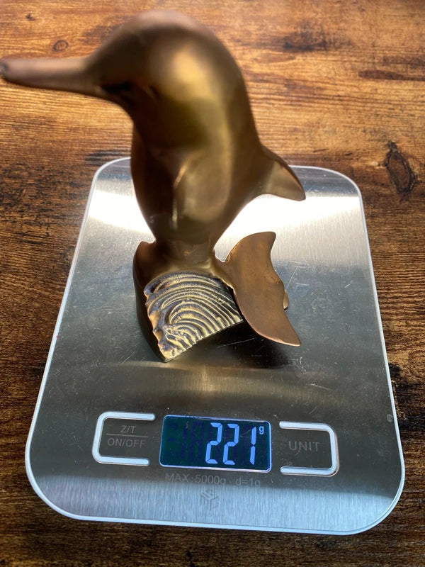 Brass jumping dolphin under wave sculpture figurine fish ocean decor